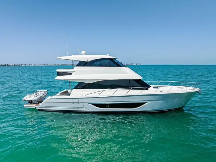 Barbara Sue III Yacht Photos Pics 2025 Maritimo M55 yacht cruising on clear blue ocean waters.