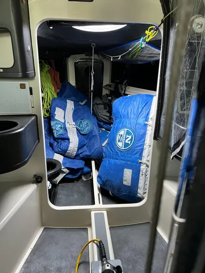 Manifest Yacht Photos Pics Interior of 2016 Offshore Racing Van Munster Boats Fred Barrett 35 with blue sails stored.