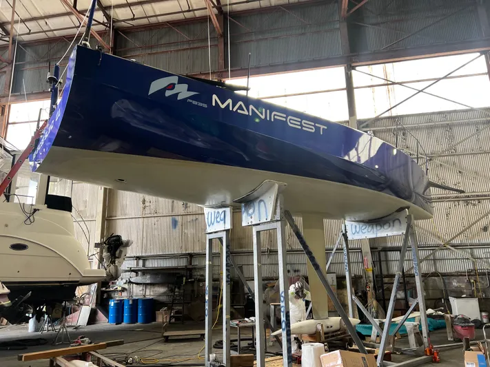 Manifest Yacht Photos Pics 2016 Offshore Racing Van Munster Boats Fred Barrett 35 in a warehouse on stands.