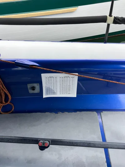 Manifest Yacht Photos Pics 2016 Offshore Racing Van Munster Boats Fred Barrett 35, blue hull detail with rope and chart.