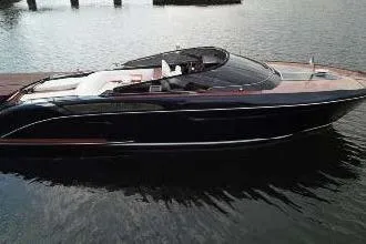  Yacht Photos Pics 2021 Riva Rivamare 38 luxury yacht on calm water, showcasing sleek design.