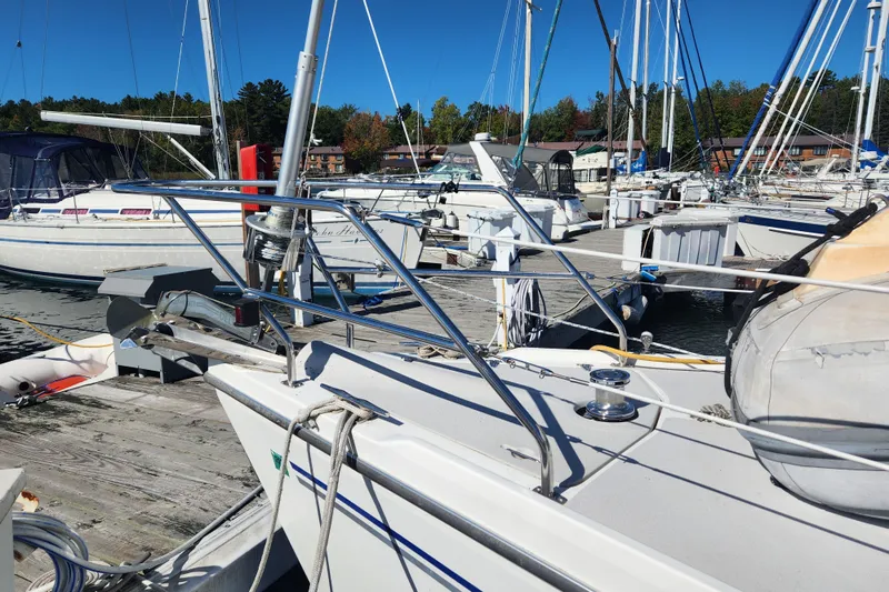 Milky Way Yacht Photos Pics Catalina 350 sailboat from 2004 docked at a marina on a sunny day.