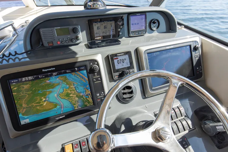 Still Noodling Yacht Photos Pics 2012 Pursuit 345 Offshore Helm with Raymarine Electronics Package