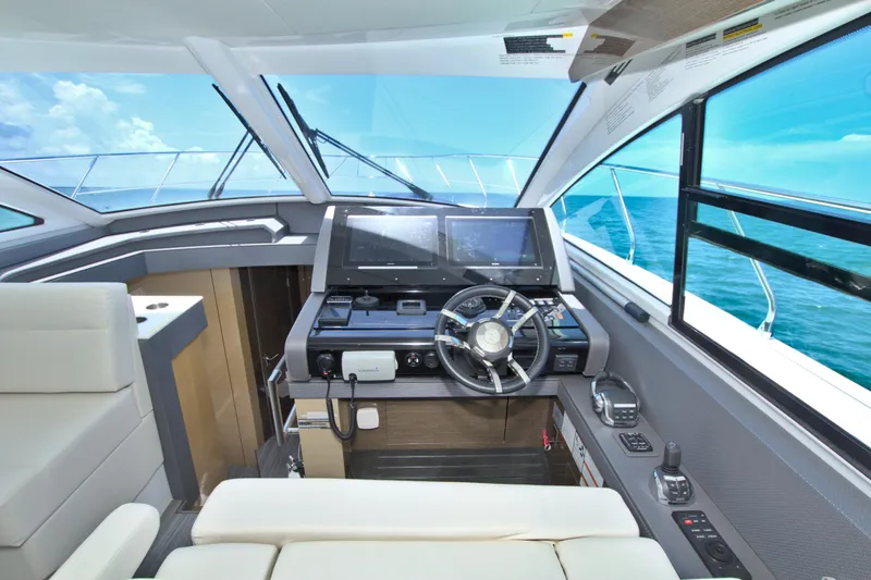 Stepping Stone V Yacht Photos Pics 2018 Cruisers Yachts 54 Fly helm with modern controls and ocean view.