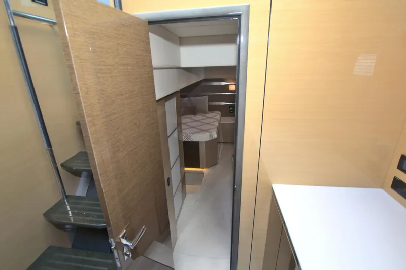 Stepping Stone V Yacht Photos Pics 2018 Cruisers Yachts 54 Fly interior with modern design and cozy bedroom.