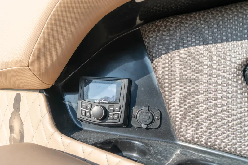  Yacht Photos Pics Control panel on 2018 Sea Ray SLX 400 boat with beige upholstery.