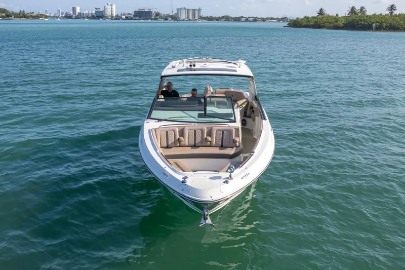  Yacht Photos Pics 2018 Sea Ray SLX 400 boat cruising on clear blue water.