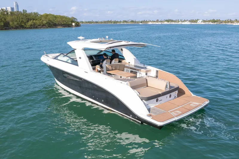  Yacht Photos Pics 2018 Sea Ray SLX 400 boat cruising on clear blue water.