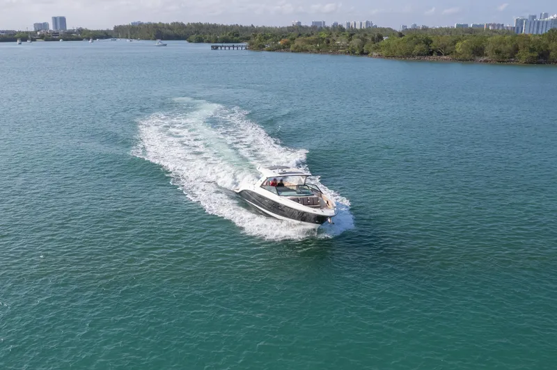  Yacht Photos Pics 2018 Sea Ray SLX 400 cruising on a scenic waterway.