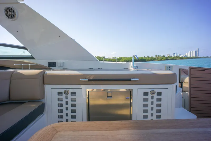  Yacht Photos Pics Luxury deck of 2018 Sea Ray SLX 400 yacht with seating and kitchenette.