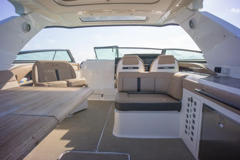  Yacht Photos Pics Luxurious interior of 2018 Sea Ray SLX 400 boat with spacious seating and modern design.