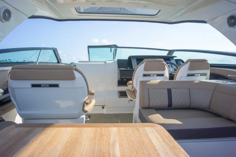  Yacht Photos Pics Interior of 2018 Sea Ray SLX 400 boat with luxurious seating and helm.