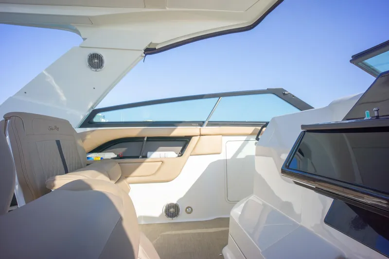  Yacht Photos Pics Interior view of 2018 Sea Ray SLX 400 boat, featuring sleek seating and modern design.