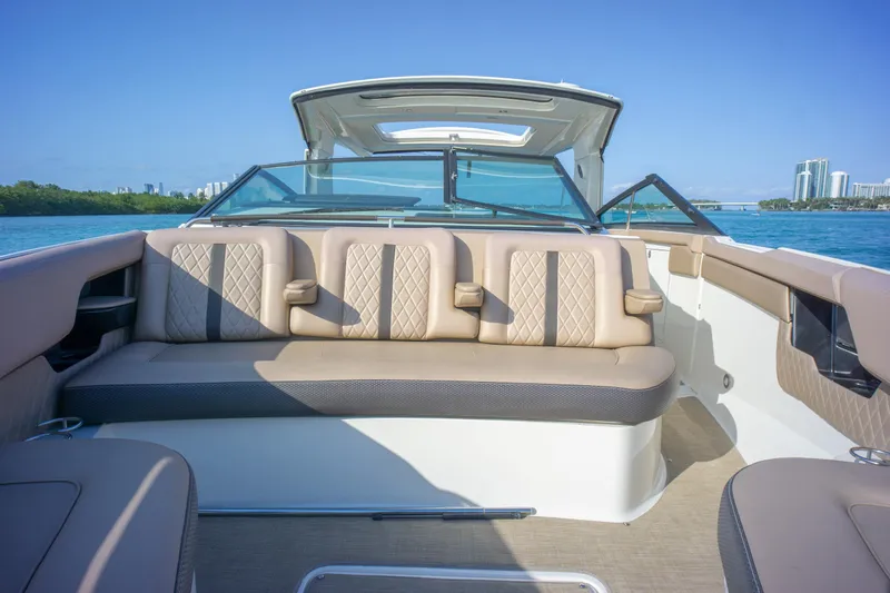  Yacht Photos Pics 2018 Sea Ray SLX 400 boat interior with luxurious seating and scenic ocean view.