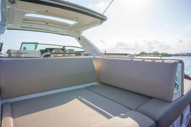  Yacht Photos Pics 2018 Sea Ray SLX 400 boat with spacious seating and open deck under sunny skies.