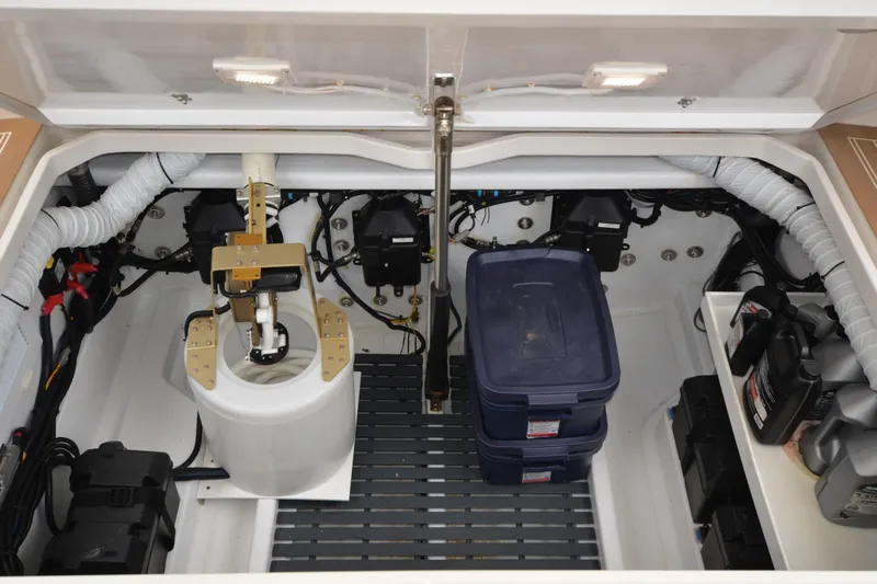 Whim Yacht Photos Pics Engine compartment of 2020 MJM 43z boat, featuring organized storage and mechanical components.
