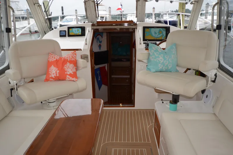 Whim Yacht Photos Pics Interior of 2020 MJM 43z yacht with plush seating and nautical decor.