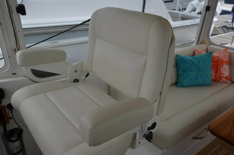 Whim Yacht Photos Pics Luxurious seating on 2020 MJM 43z yacht with colorful cushions.
