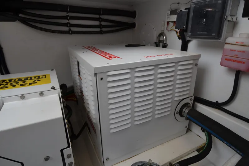 Whim Yacht Photos Pics Engine room of 2020 MJM 43z boat with generator and control panel.