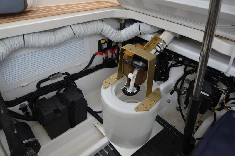 Whim Yacht Photos Pics Engine compartment of 2020 MJM 43z boat, showcasing mechanical components and wiring.