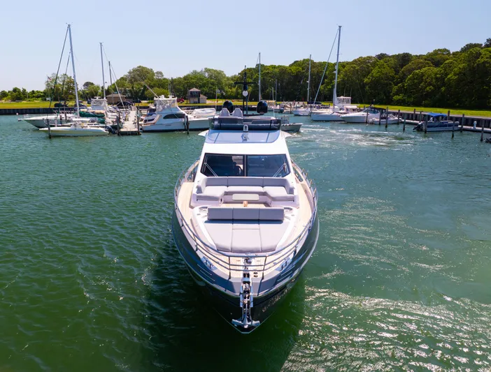Second Chances Yacht Photos Pics 2024 Azimut S7 yacht docked in a scenic marina with surrounding boats.