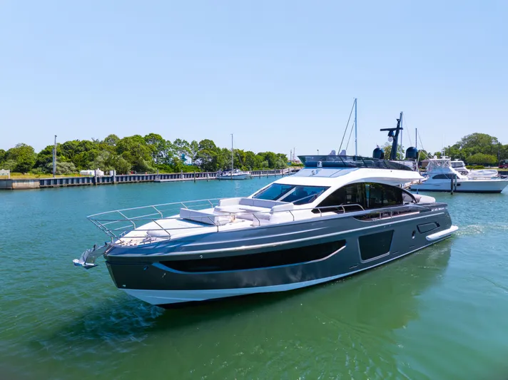 Second Chances Yacht Photos Pics 2024 Azimut S7 yacht cruising in a serene marina setting.