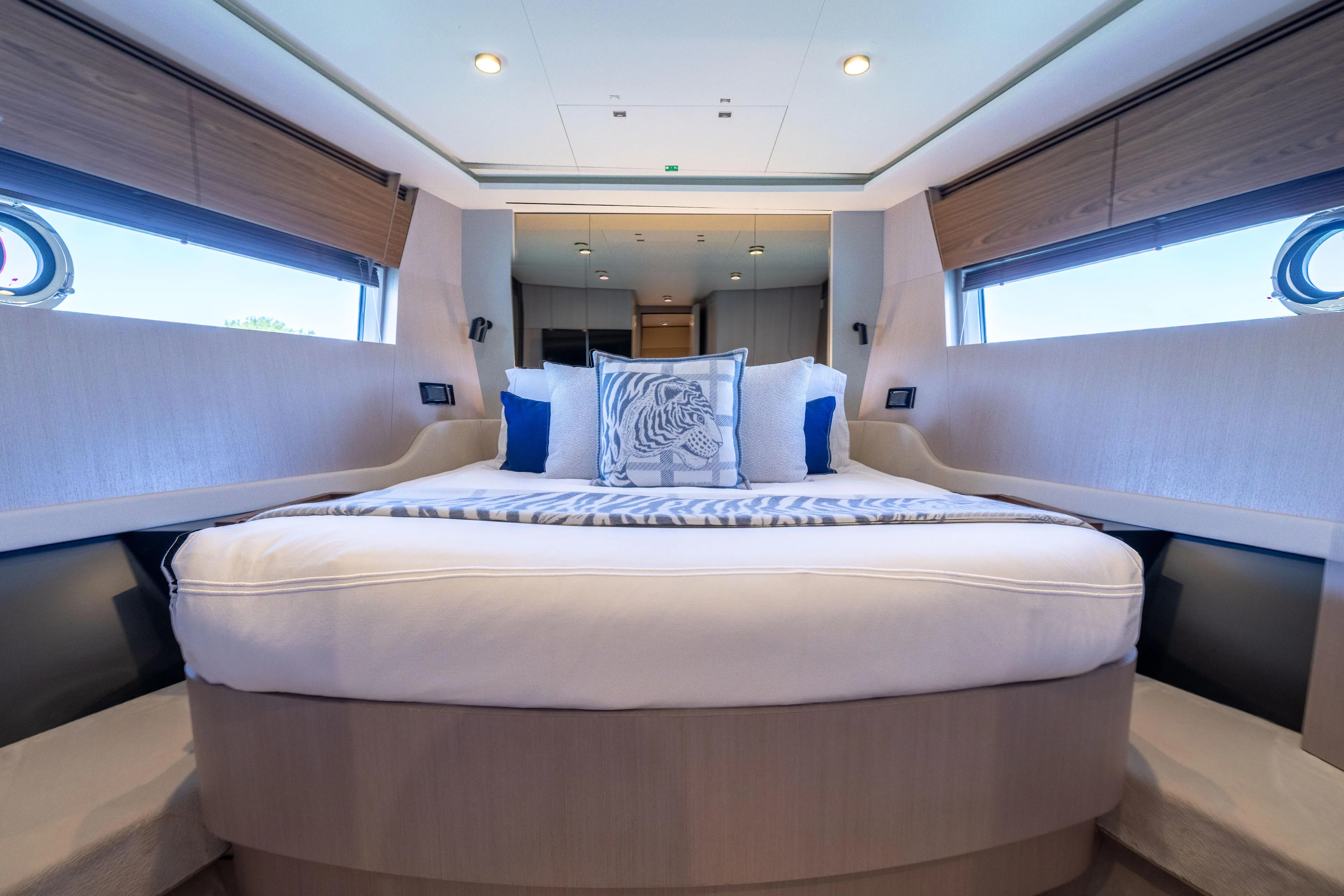 Second Chances Yacht Photos Pics Luxurious bedroom interior of 2024 Azimut S7 yacht with elegant bedding and modern design.