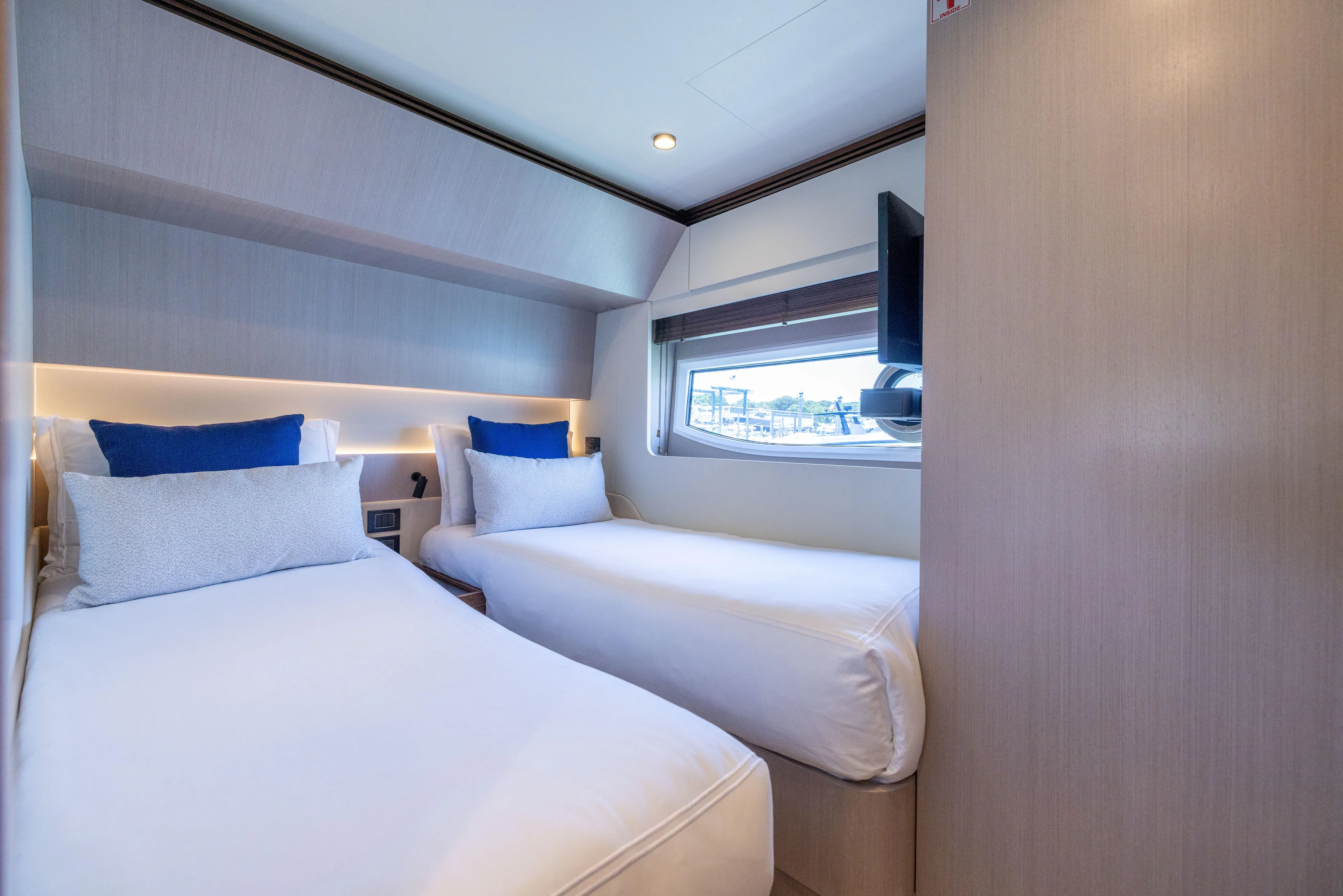 Second Chances Yacht Photos Pics Luxurious twin cabin interior of 2024 Azimut S7 yacht with modern design.