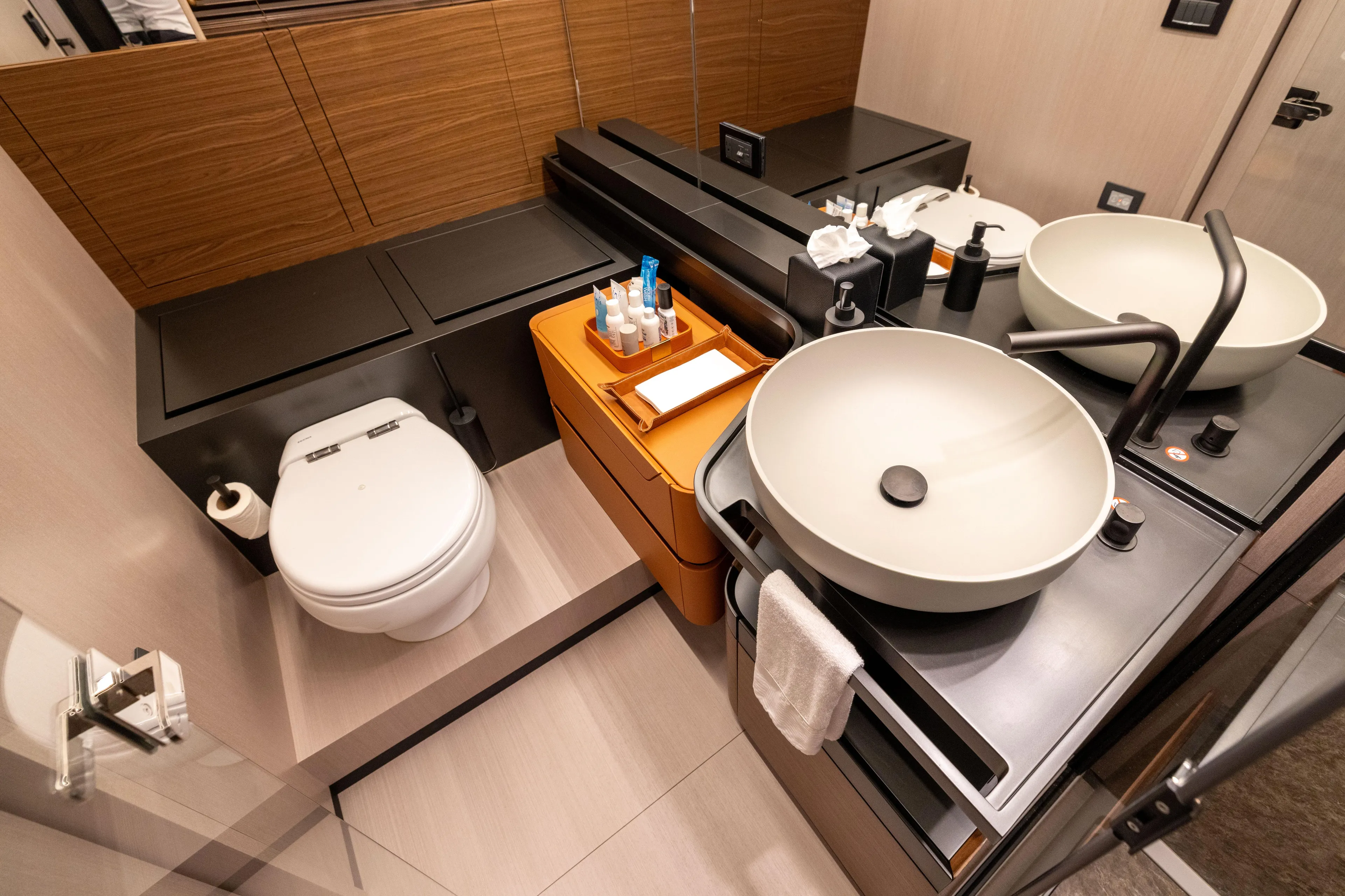 Second Chances Yacht Photos Pics Luxurious bathroom in 2024 Azimut S7 yacht with modern fixtures and elegant design.