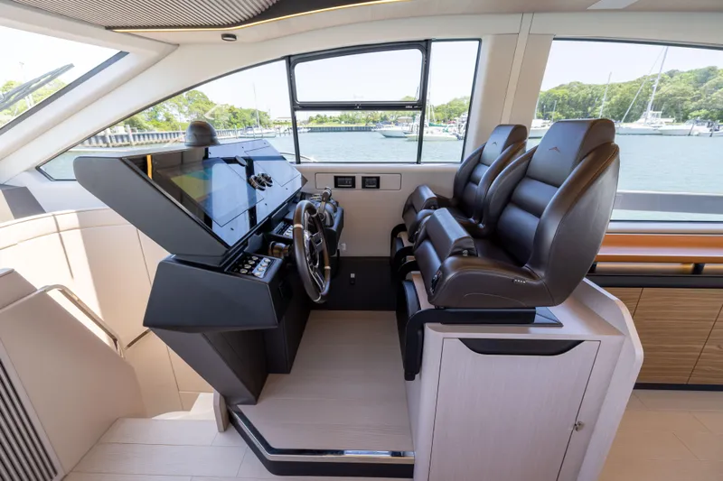 Second Chances Yacht Photos Pics 2024 Azimut S7 yacht helm with modern controls and luxurious seating.