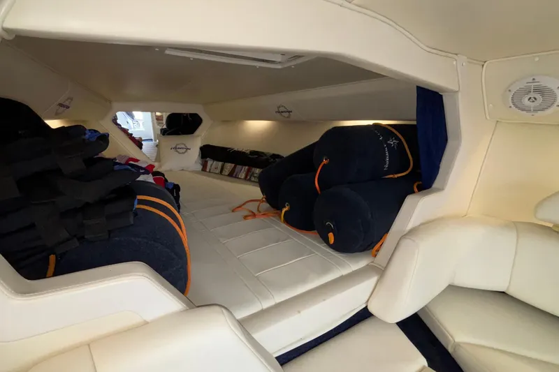  Yacht Photos Pics Interior of a 2007 Fountain 42 Lightning boat with seating and storage.