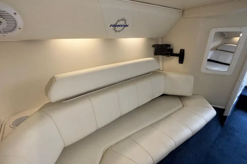  Yacht Photos Pics Interior of 2007 Fountain 42 Lightning boat with white leather seating.