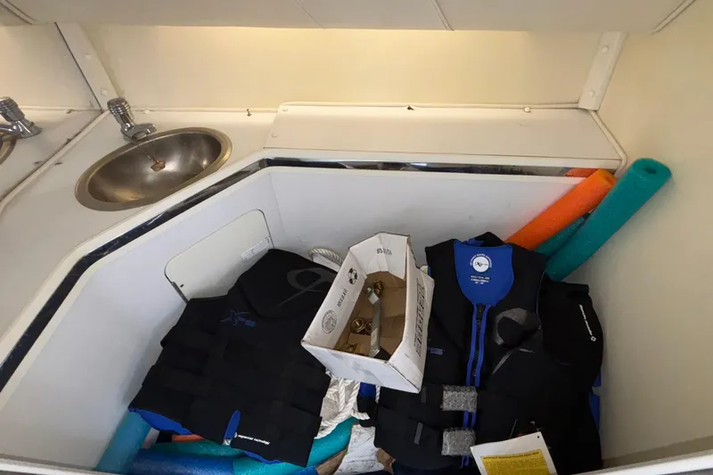  Yacht Photos Pics Interior of 2007 Fountain 42 Lightning boat with life vests and pool noodles.