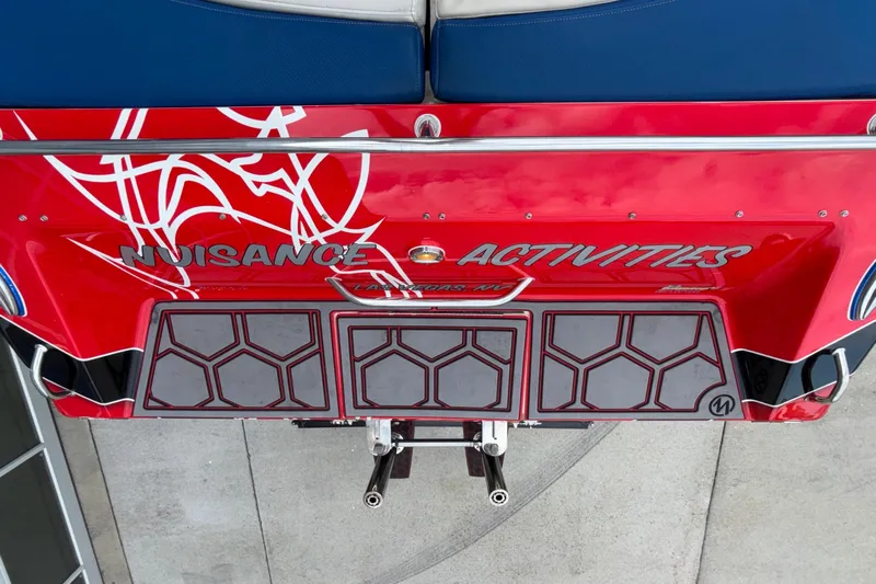  Yacht Photos Pics Rear view of a 2007 Fountain 42 Lightning boat with red and white graphics.