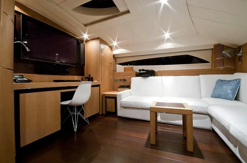  Yacht Photos Pics Luxurious interior of 2006 Pershing 115 yacht with modern furnishings and elegant design.