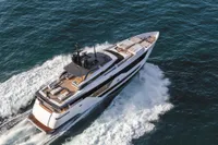 Luxurious 2019 Custom Line 106 yacht cruising on open sea, aerial view.
