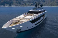 Luxurious 2019 Custom Line 106 yacht cruising on serene blue waters.