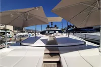 Luxurious 2019 Custom Line 106 yacht deck with sunshades and sleek design.
