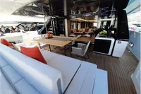 Luxurious yacht interior with modern seating, dining area, and sleek design, Custom Line 106, 2019 model.