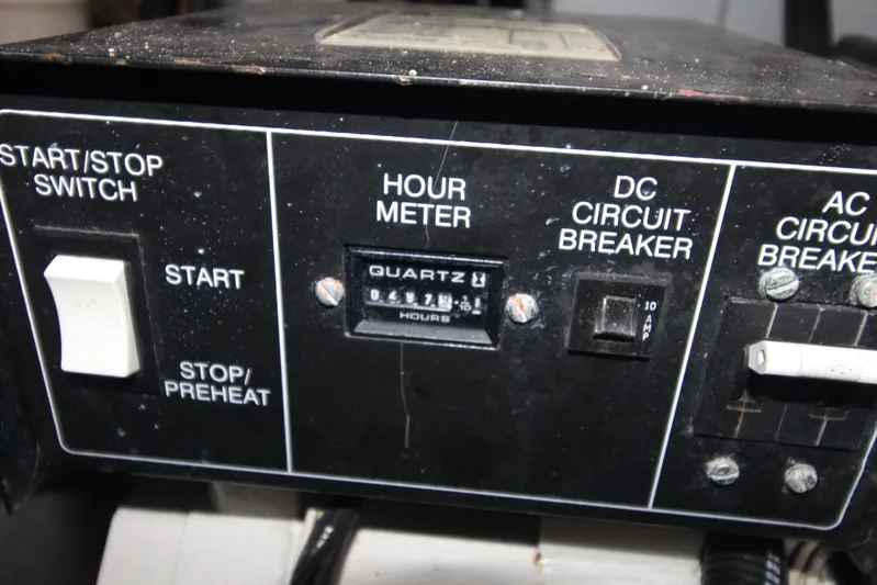 Jet Lag Yacht Photos Pics Control panel of a 2000 Silverton 392 Motor Yacht with hour meter and circuit breakers.