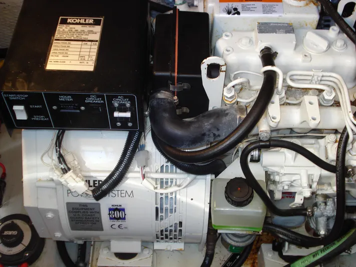 Jet Lag Yacht Photos Pics Engine room of 2000 Silverton 392 Motor Yacht with Kohler power system.