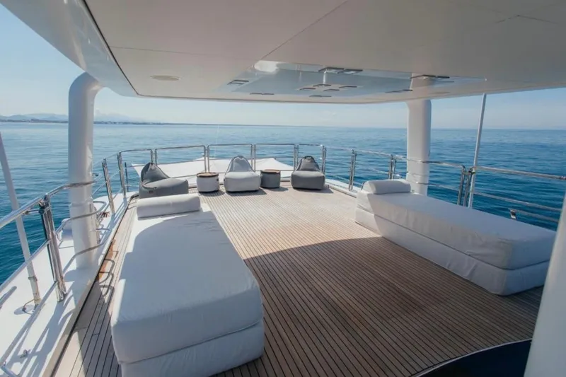 Lady In Blue Yacht Photos Pics Spacious deck of 1999 Clemna Rossi Navi 135 yacht with ocean view.