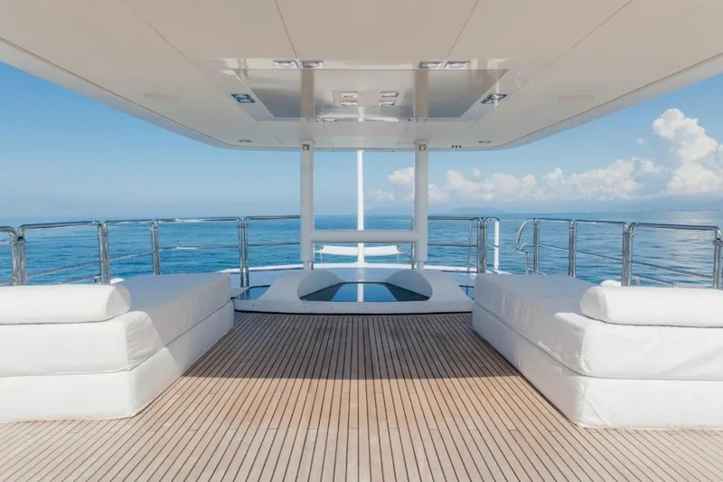 Lady In Blue Yacht Photos Pics Luxurious deck of 1999 Clemna Rossi Navi 135 yacht with ocean view.