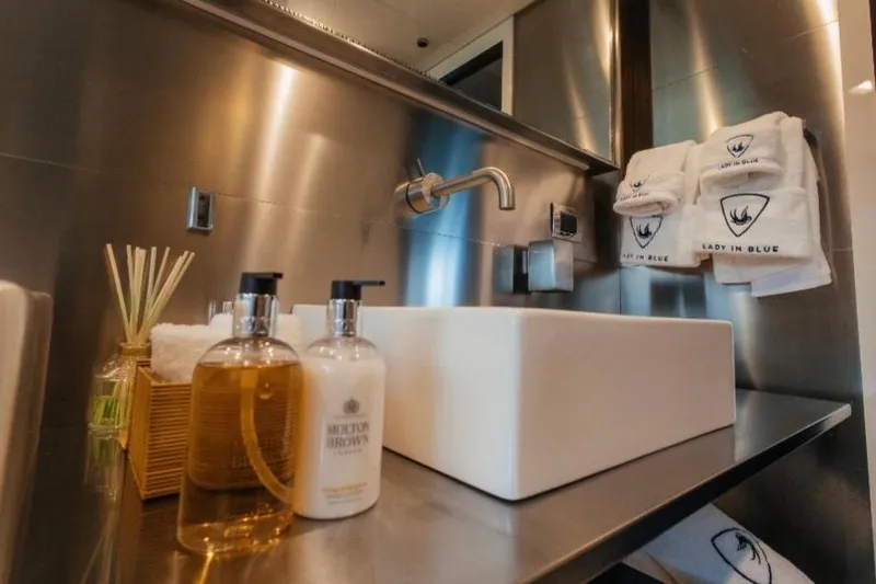 Lady In Blue Yacht Photos Pics Luxury yacht bathroom with modern sink, branded towels, and premium toiletries on Clemna Rossi Navi 135.