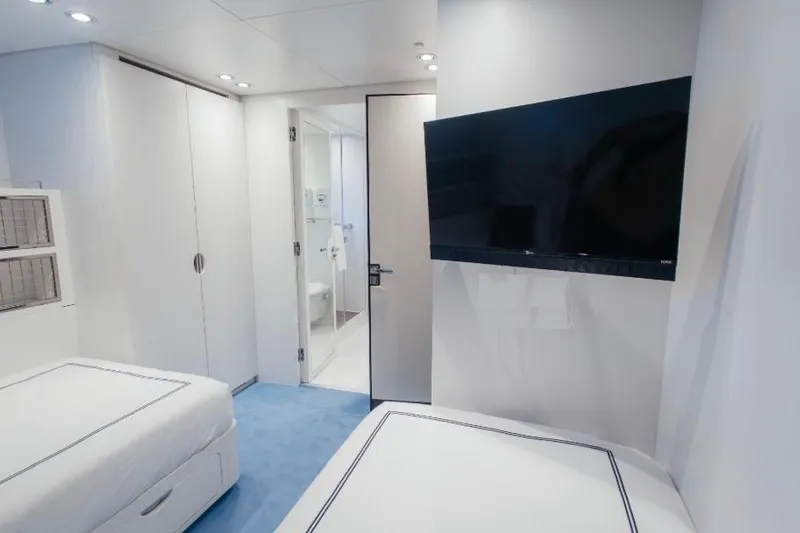 Lady In Blue Yacht Photos Pics Luxurious cabin interior of 1999 Clemna Rossi Navi 135 yacht with modern amenities.