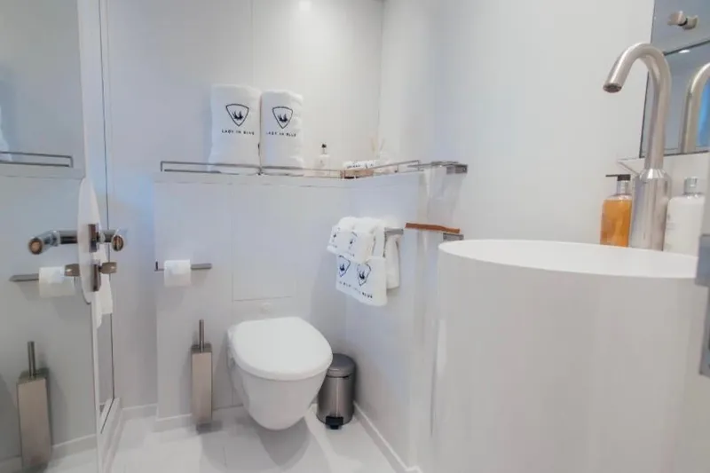 Lady In Blue Yacht Photos Pics Luxurious bathroom on Clemna Rossi Navi 135 yacht, featuring modern fixtures and elegant design.