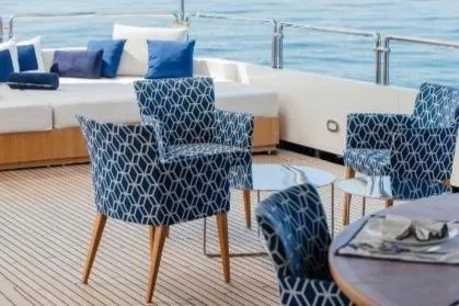 Lady In Blue Yacht Photos Pics Luxury yacht deck with patterned chairs, Clemna Rossi Navi 135, 1999 model.