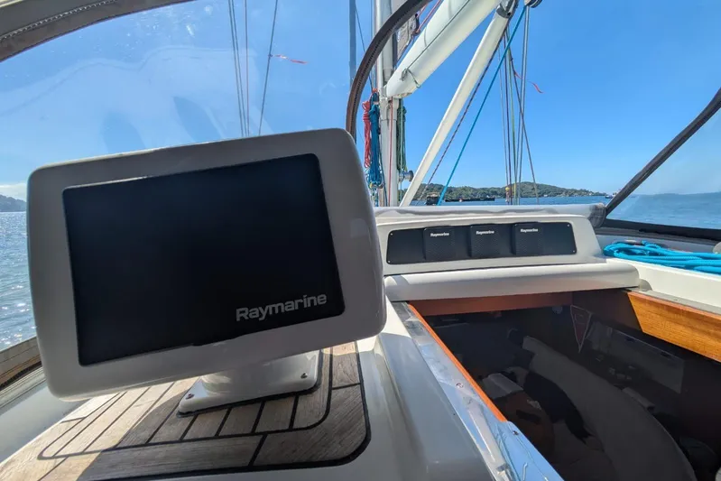 Making Time Yacht Photos Pics Cockpit view of 2004 Oyster 53 sailboat with Raymarine navigation system.
