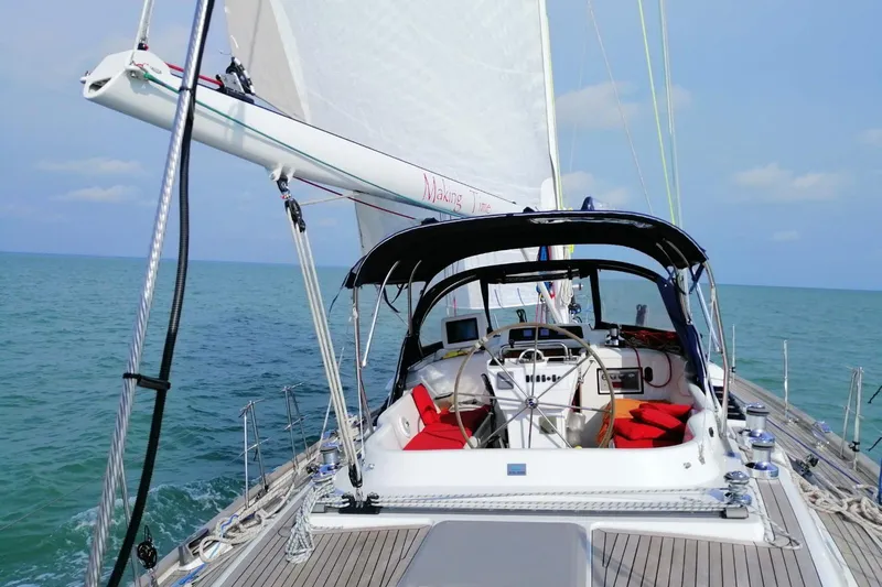 Making Time Yacht Photos Pics Sailing yacht Oyster 53 (2004) on open sea with clear skies.