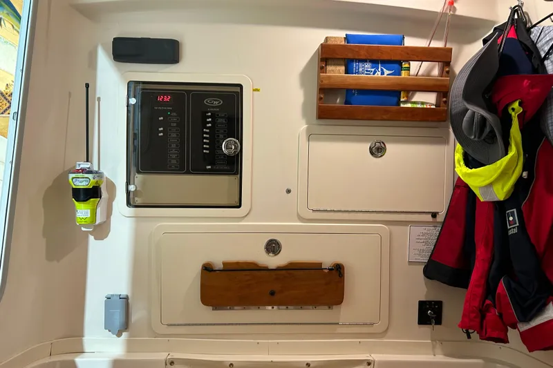  Yacht Photos Pics Interior of 2019 Grady-White Canyon 336 boat with control panel and storage compartments.